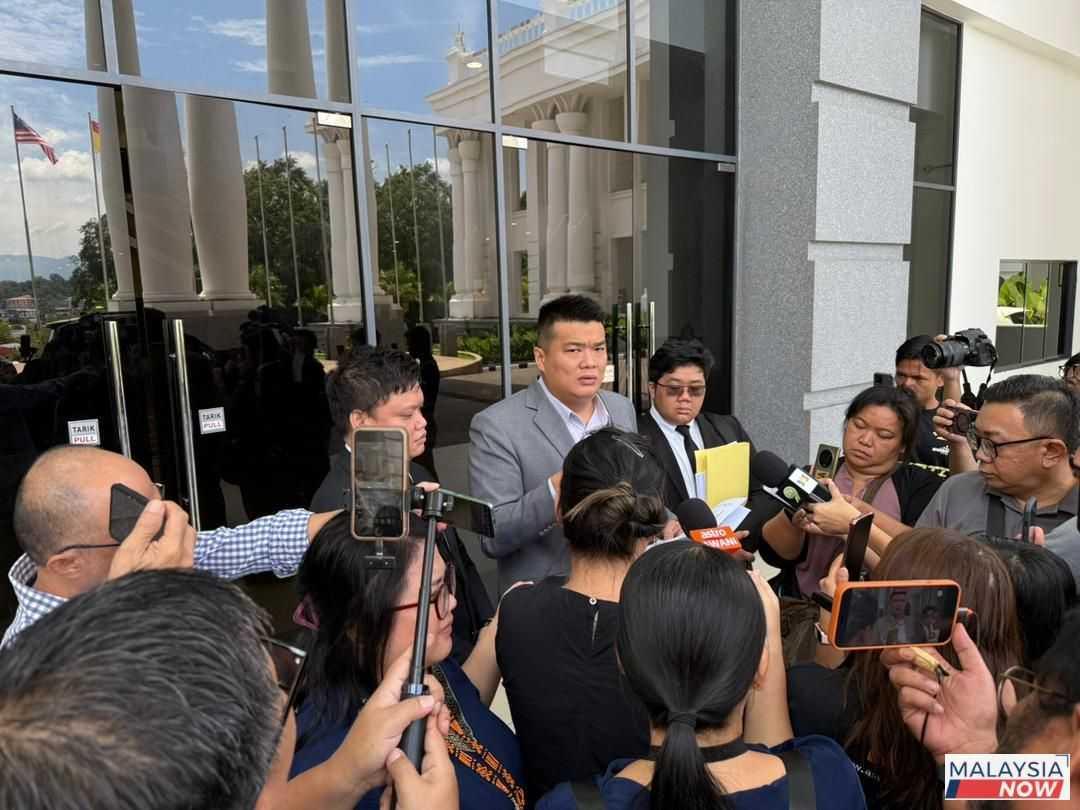 Albert Tei outside the Kota Kinabalu Sessions Court today.