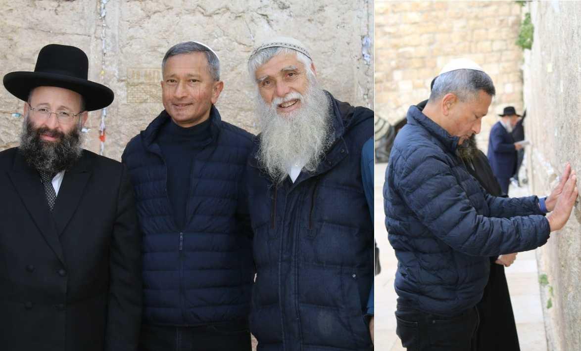 Vivian Balakrishnan flanked by Zionist rabbi Shmuel Rabinowitz and Israeli official Mordechai Eliav during his visit to Jerusalem in 2022. Right: Vivian Balakrishnan in deep prayer at the Western Wall, a site of Jewish pilgrimage.