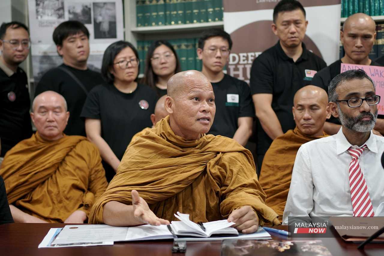 Abbot Bhante Kusala speaks at a press conference in Petaling Jaya to highlight the plight of the Sakyamuni Caves Monastery in Gunung Kanthan, Perak.