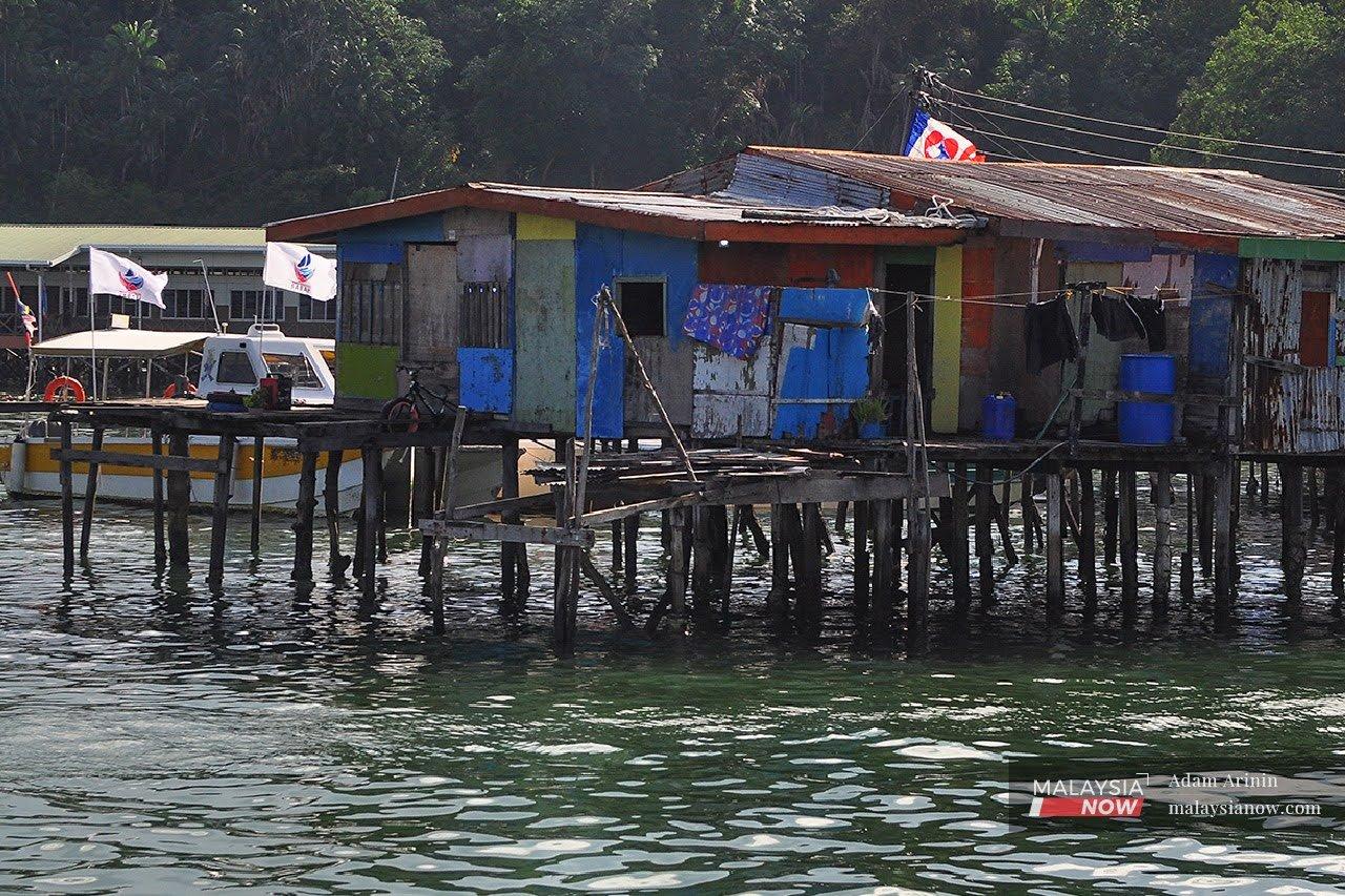 In Kampung Kesuapan, once recognised by the authorities as the cleanest village in Pulau Gaya off Kota Kinabalu, houses are built on stilts above water.