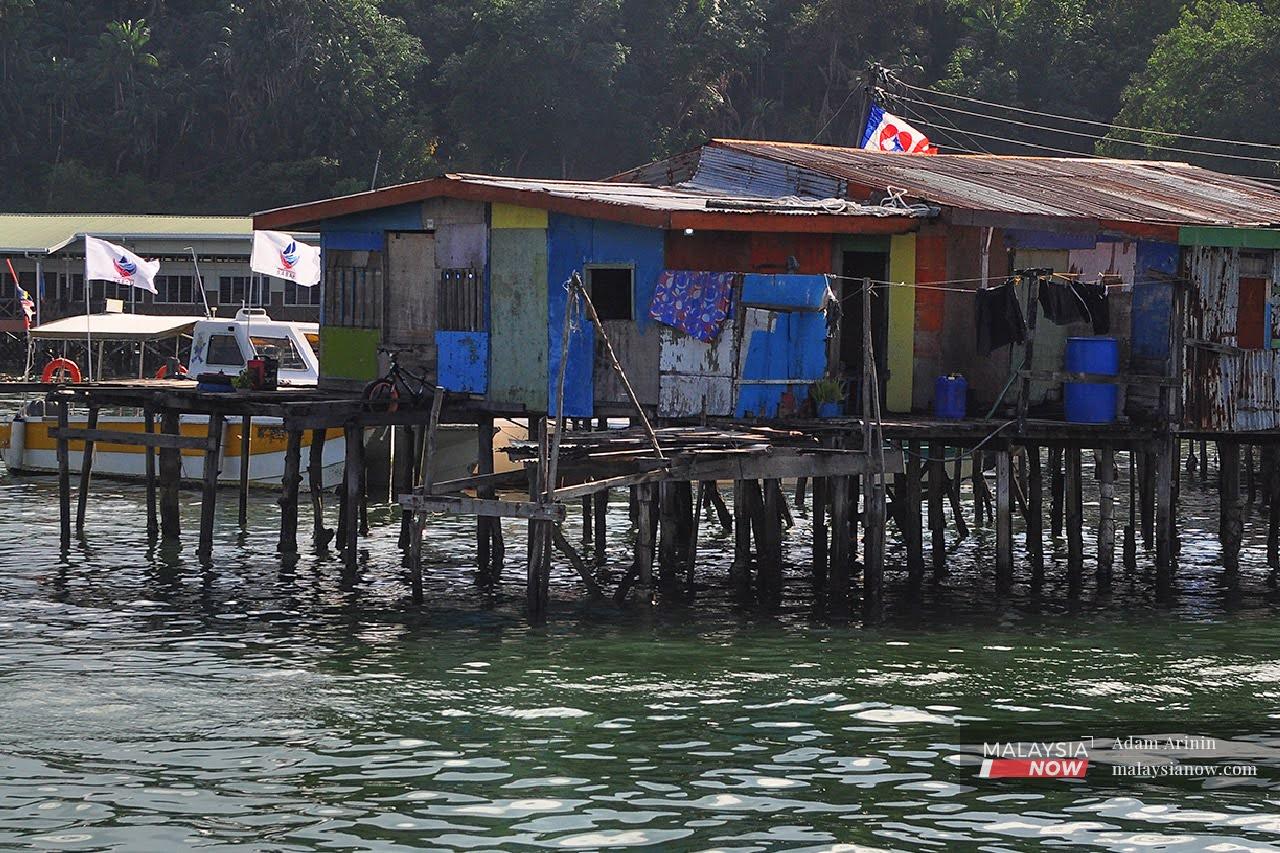 In Kampung Kesuapan, once recognised by the authorities as the cleanest village in Pulau Gaya off Kota Kinabalu, houses are built on stilts above water.