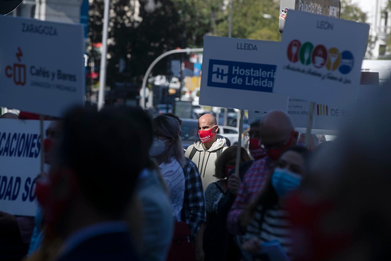 Bar and restaurant owners and workers protest against Covid-19-related restrictions in their sector in an earlier demonstration in Madrid, Spain, on Sept 9. Photo: AP