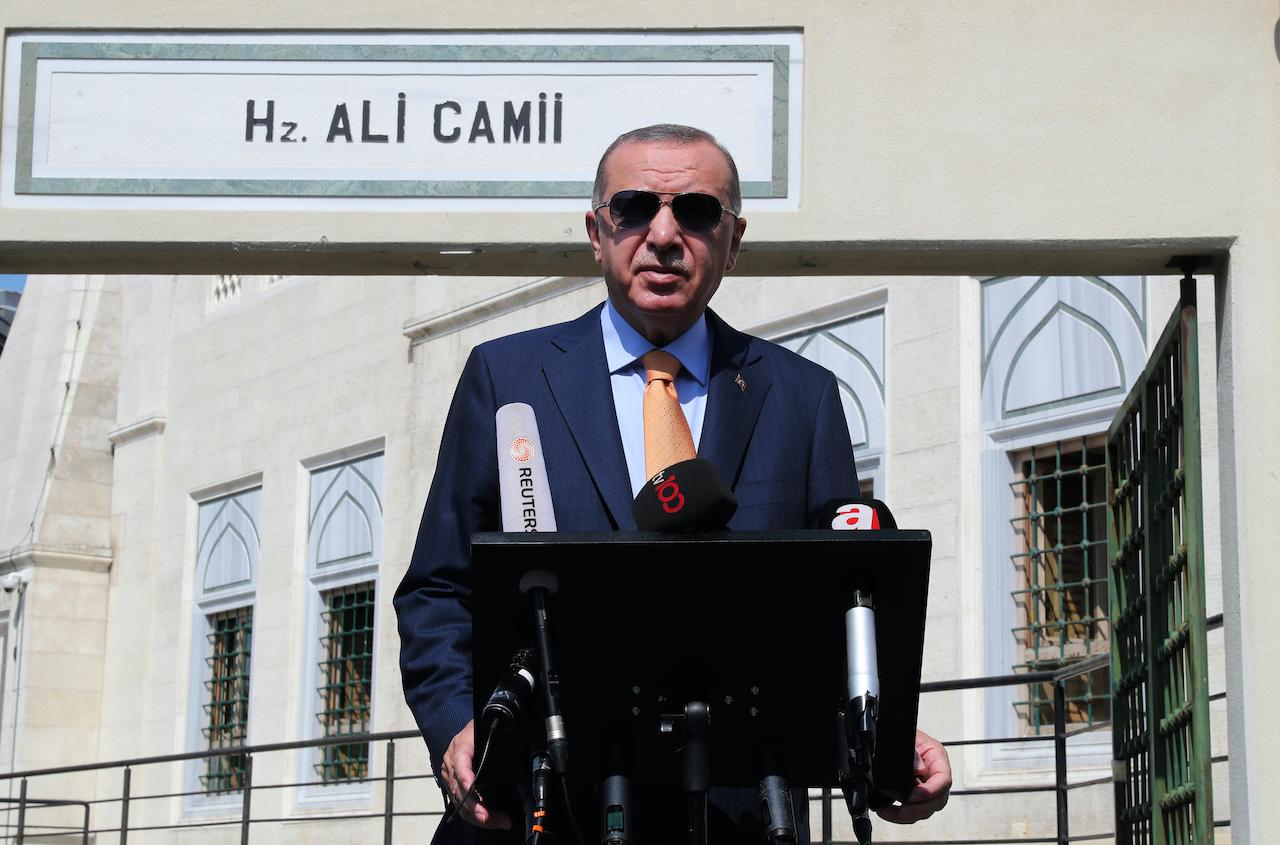 Turkish President Recep Tayyip Erdogan speaks to the media following Friday prayers at a mosque in Istanbul, Sept 18. Photo: AP