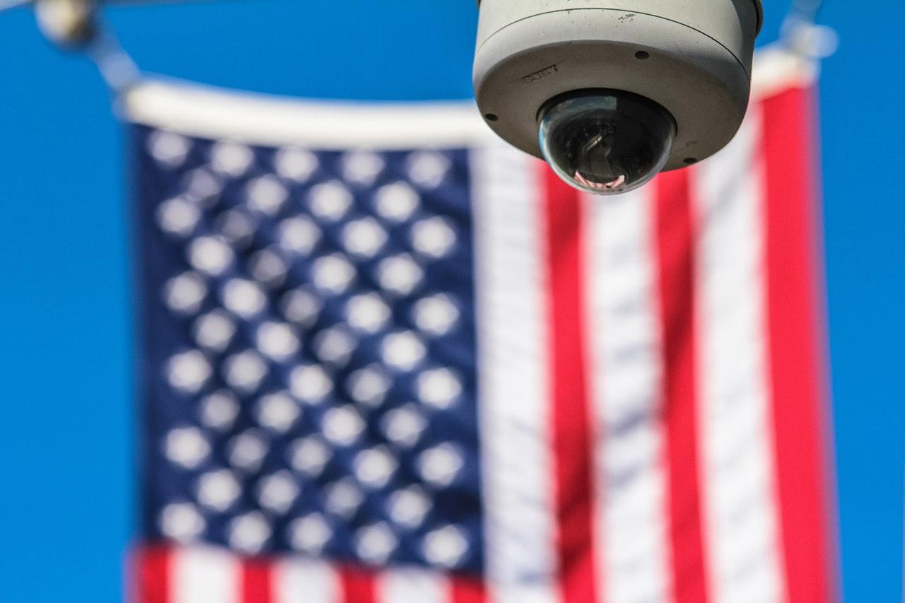 US-flag-cctv-spying-pexels