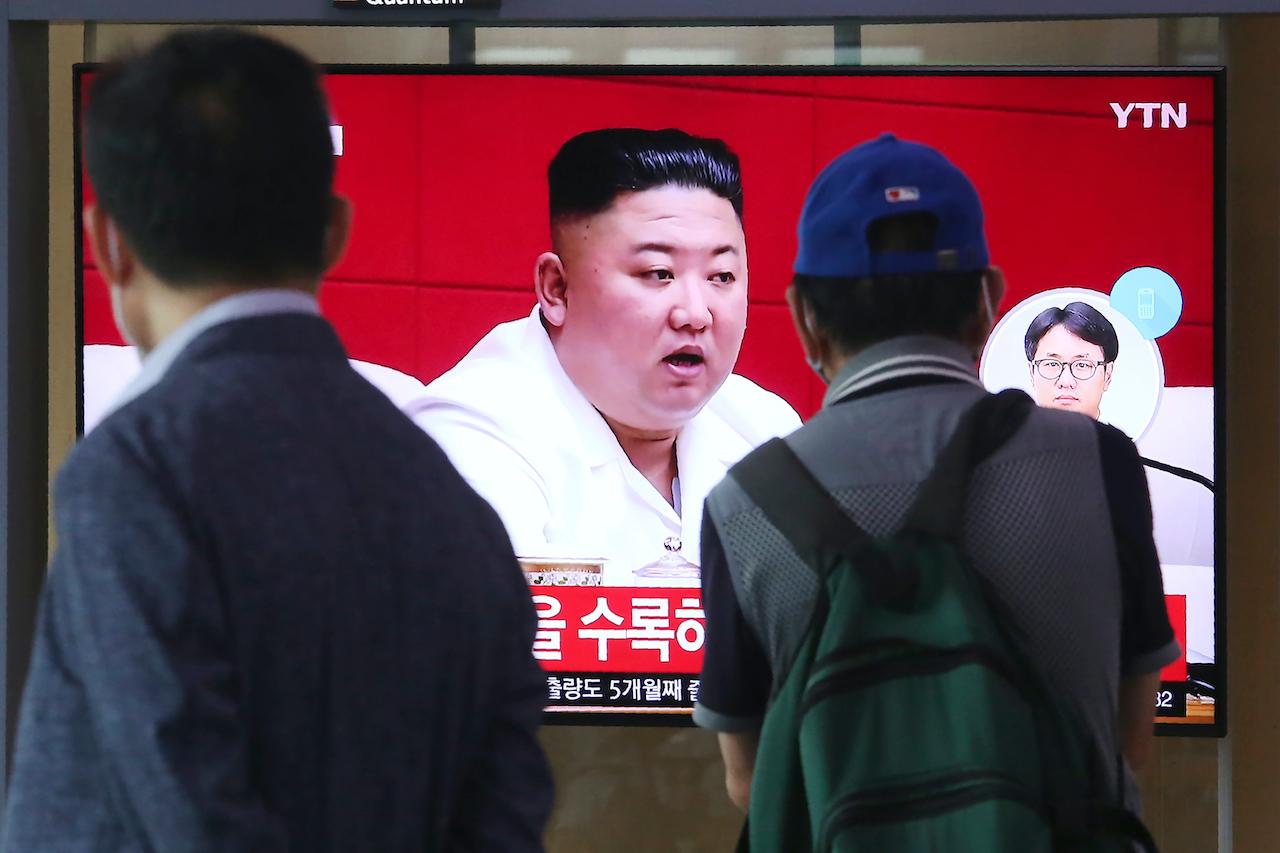 People watch a screen showing a file image of North Korean leader Kim Jong Un during a news programme at the Seoul Railway Station in Seoul, South Korea, Sept 25. Photo: AP