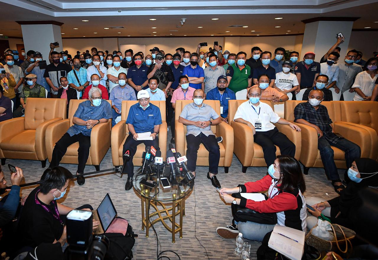 Sabah Bersatu chief Hajiji Noor with PN secretary-general Hamzah Zainuddin at a press conference before the results of the Sabah state election in Kota Kinabalu on Sept 27. Photo: Bernama