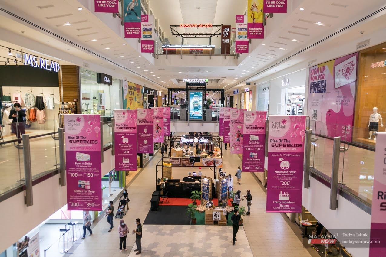 A view of a near-empty shopping mall in the Klang Valley yesterday. Malls have reported a decline in visitors wary of Covid-19 cases among workers.