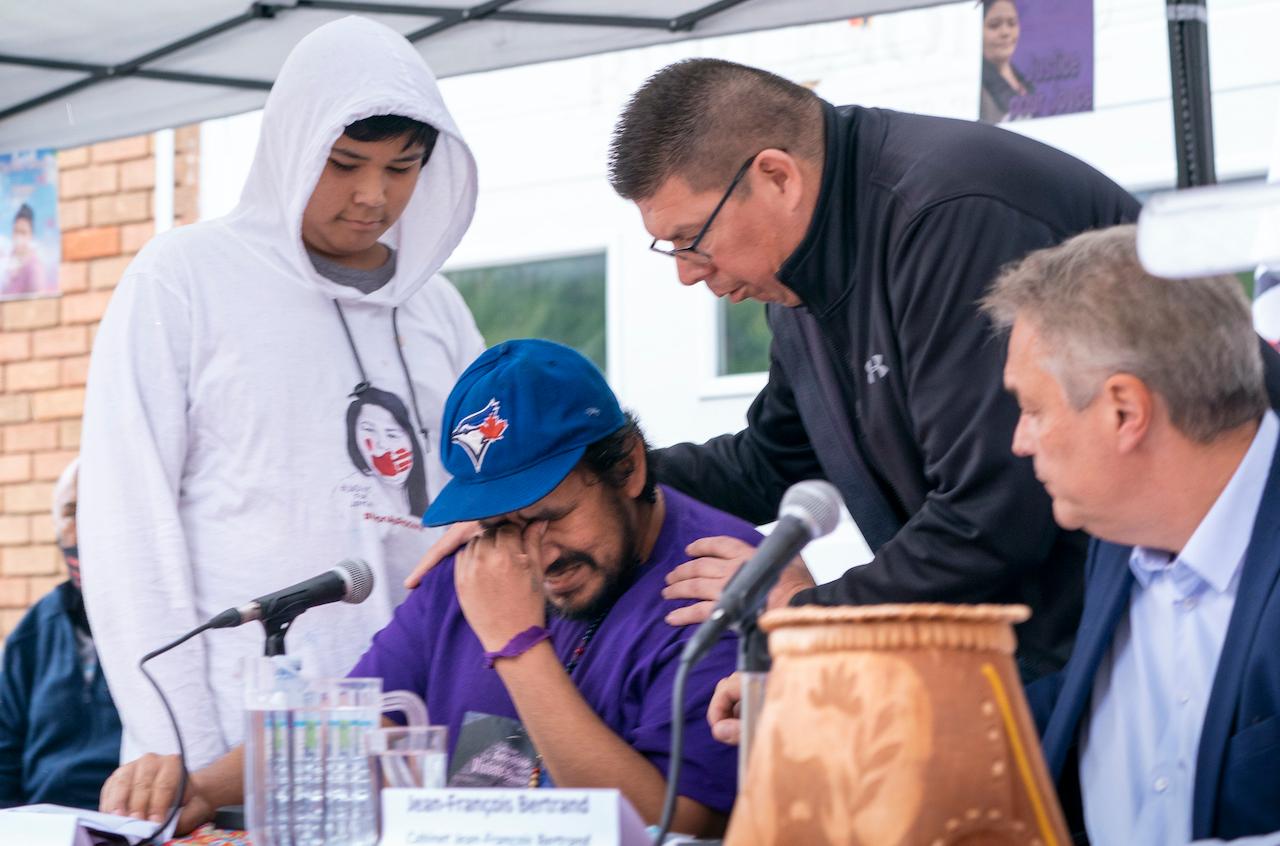 Carol Dube, husband of Joyce Echaquan, is consoled by one of his sons Dayvon, and a friend as he breaks down while reading a statement in Joliette, Quebec on Oct 2. Photo: AP