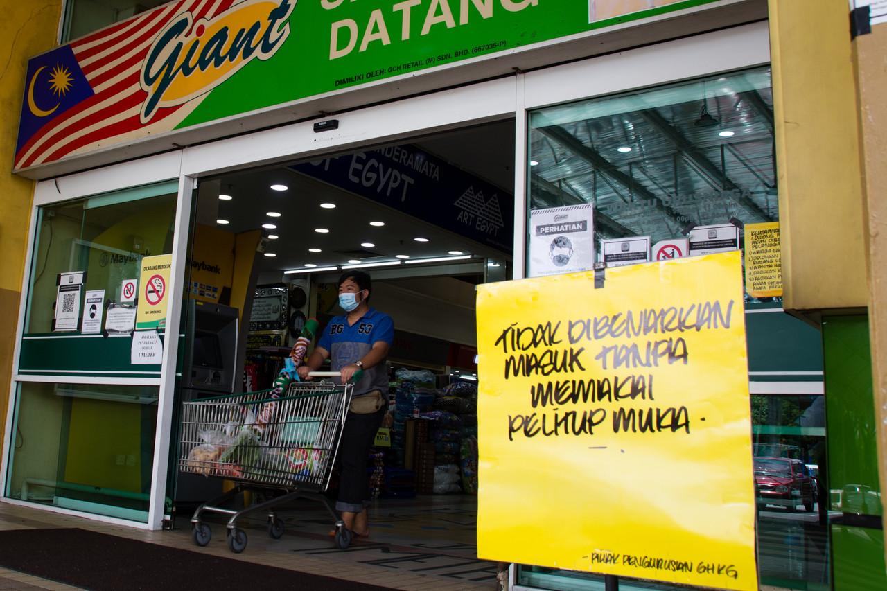 Limits on the number of people per household allowed to go out for groceries are among the SOP for the CMCO in Selangor, Kuala Lumpur, Putrajaya and Sabah. Photo: Bernama