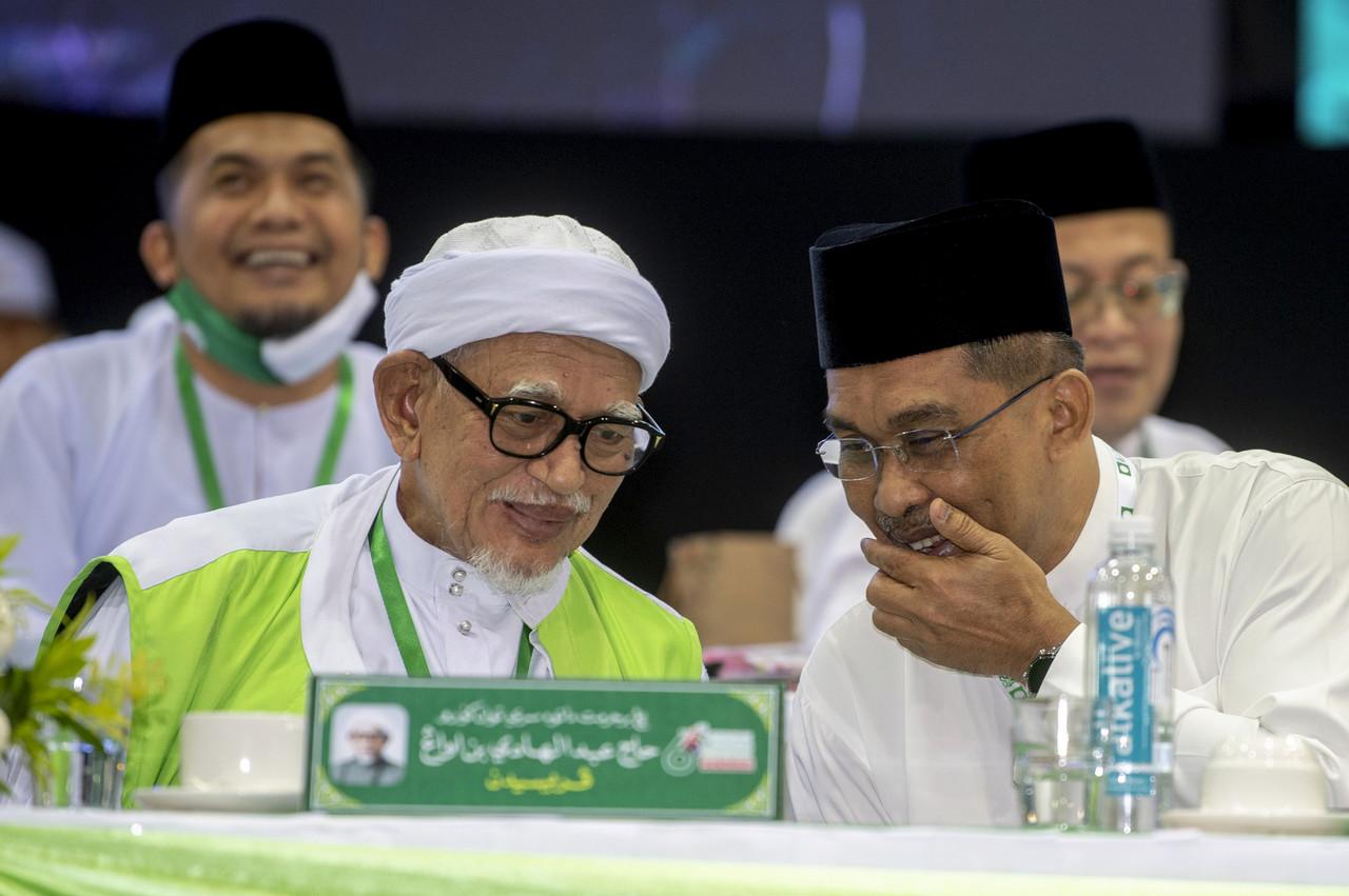 PAS president Abdul Hadi Awang (left) with PAS secretary-general Takiyuddin Hassan at the party's annual congress on Sept 13. Photo: Bernama