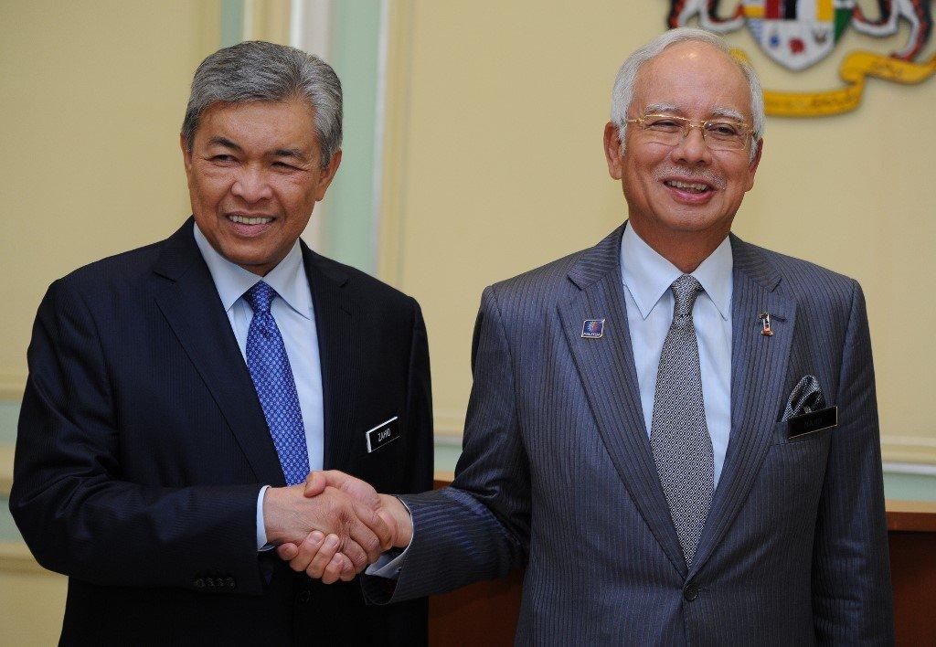 Bekas perdana menteri Najib Razak dan bekas timbalannya Ahmad Zahid Hamidi. Gambar: AFP