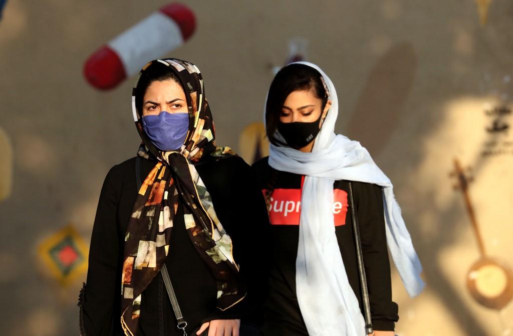 Under Islamic law in Iran, women must wear a hijab that covers the head and neck and that conceals their hair. Photo: AFP
