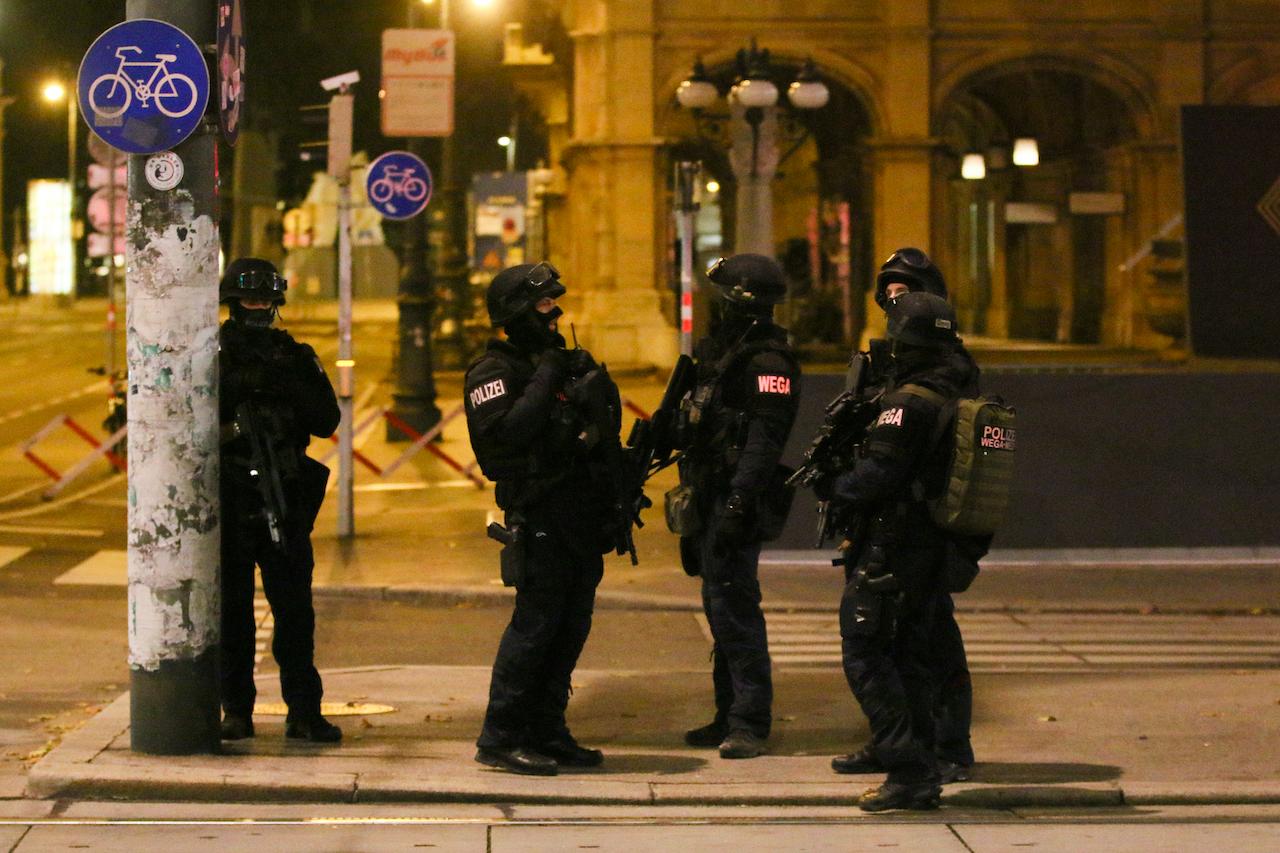 Police officers in position during an operation, in Vienna, Austria, Nov 3. Photo: AP