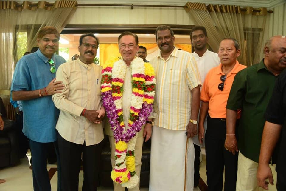PKR chief Anwar Ibrahim with P Thiagarajan Pavadai (4th left) in a group photograph taken in October last year. Photo: Facebook