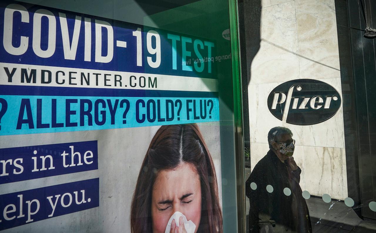 An ad for Covid-19 testing is shown outside the Pfizer world headquarters in New York on Nov 9. Photo: AP