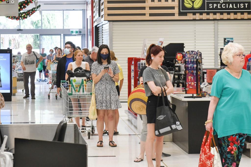 People queue at a supermarket after the South Australian state government announced a six-day lockdown because of a Covid-19 outbreak in Adelaide on Nov 18. Photo: AFP