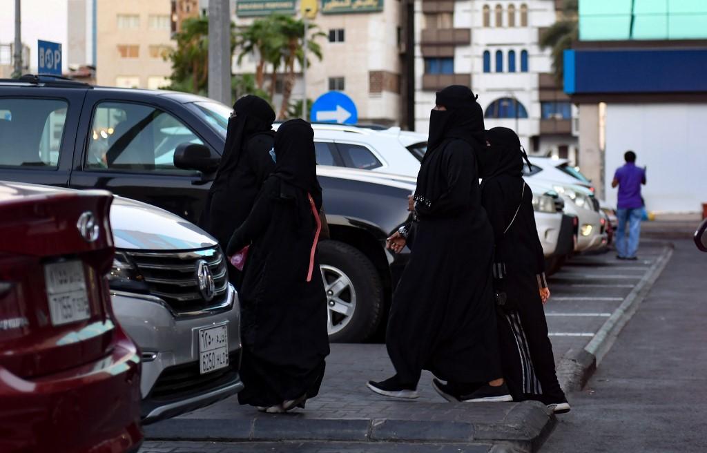 Women walk in a street in the Saudi city of Jeddah on Nov 11. Photo: AFP