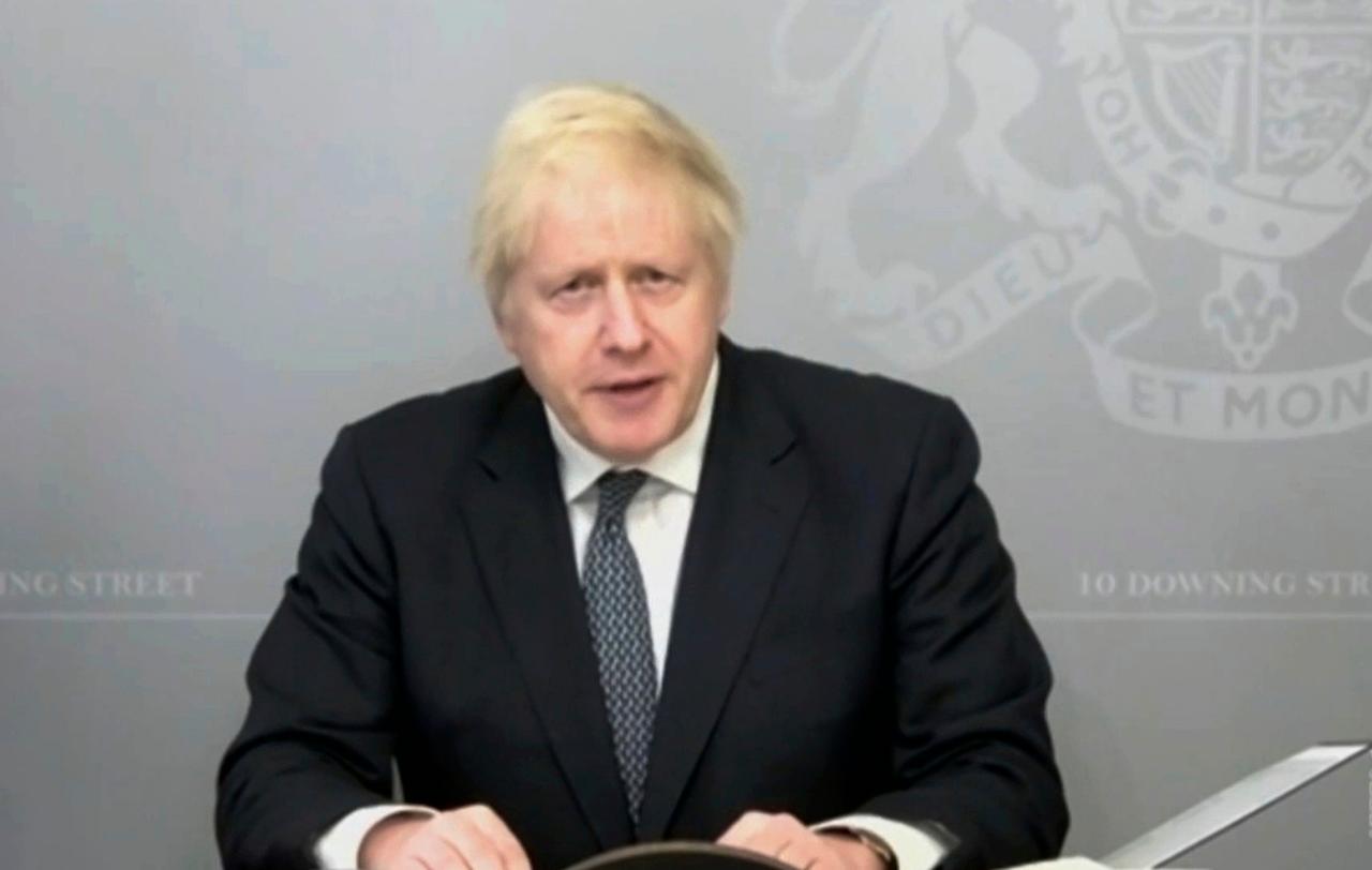 In this screen grab, Britain's Prime Minister Boris Johnson gives a statement on the defence review via video link from 10 Downing Street, in London, Nov 19. Photo: AP