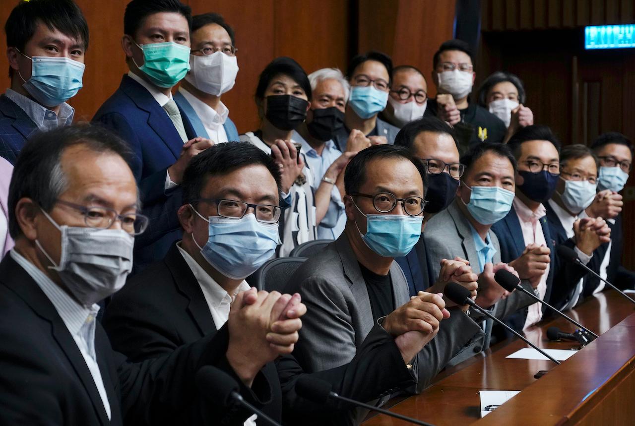 Hong Kong's pro-democracy legislators in a show of solidarity before a press conference at the Legislative Council in Hong Kong, Nov 9. Photo: AP
