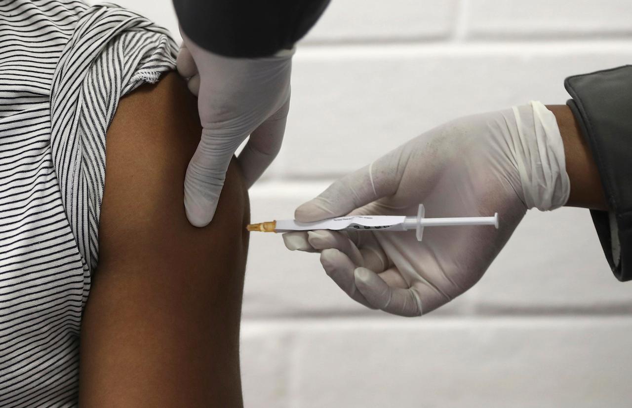 A volunteer receives an injection in Johannesburg as part of Africa's first participation in a Covid-19 vaccine trial developed at the University of Oxford in Britain in conjunction with the pharmaceutical company AstraZeneca. Photo: AP