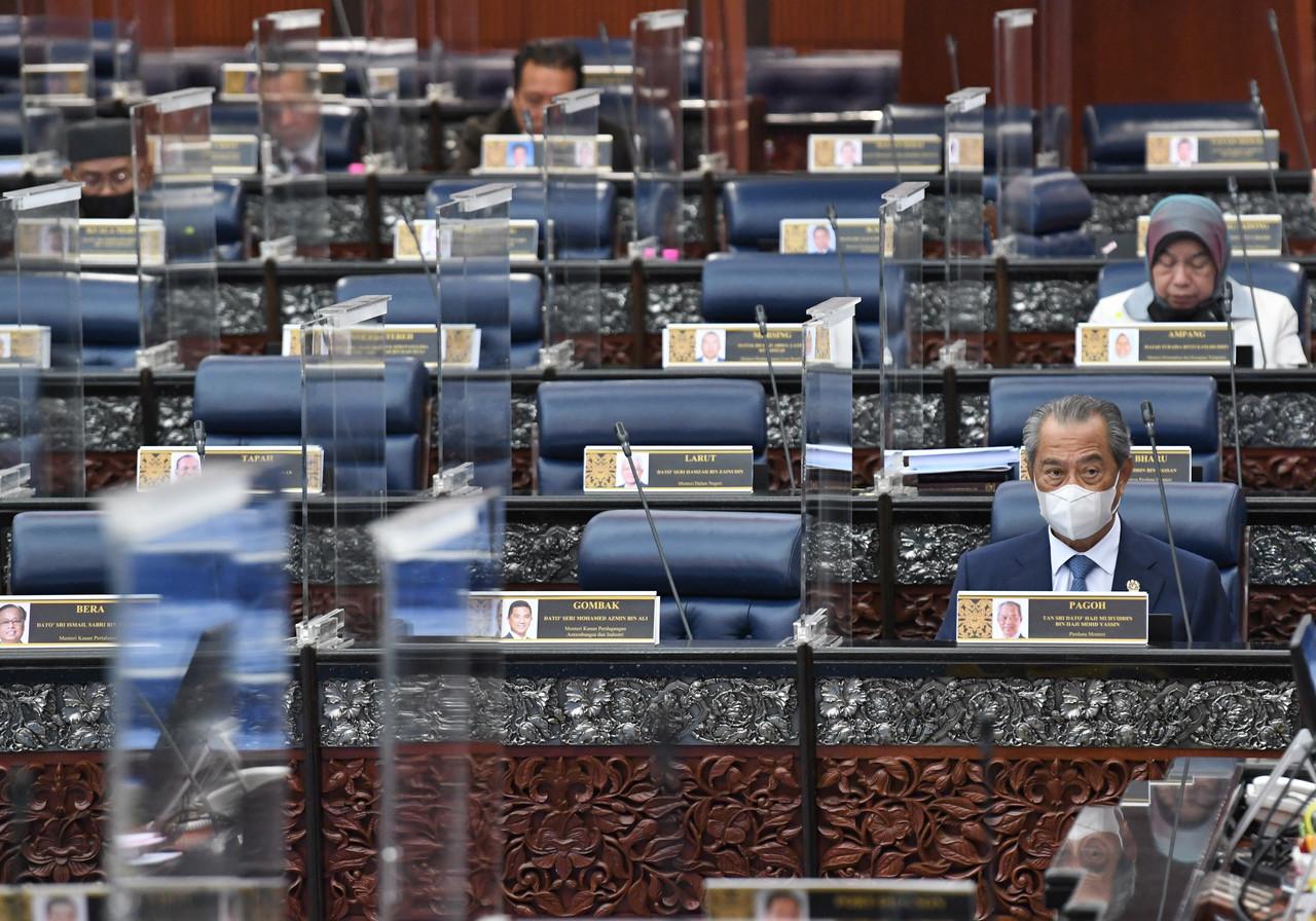 Prime Minister Muhyiddin Yassin attends a Dewan Rakyat session at the Parliament building in Kuala Lumpur on Nov 19. Photo: Bernama