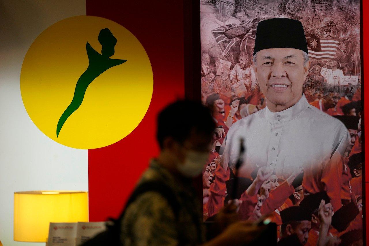 Umno diminta kekal bersama PAS dan Bersatu di Perak. Gambar: AP
