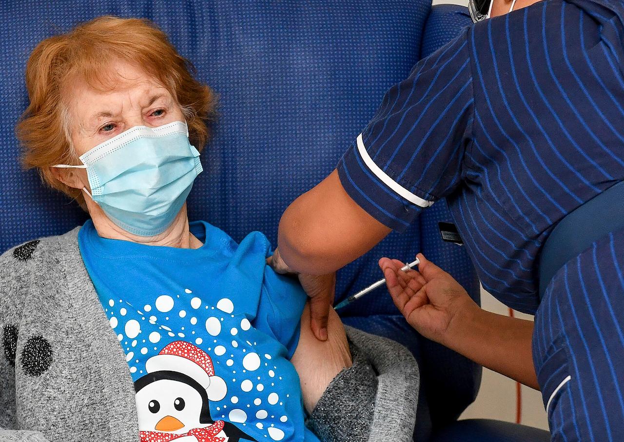 Margaret Keenan, the first patient in the UK to receive the Pfizer-BioNTech Covid-19 vaccine, administered at University Hospital in Coventry, England, Dec 8. Photo: AP