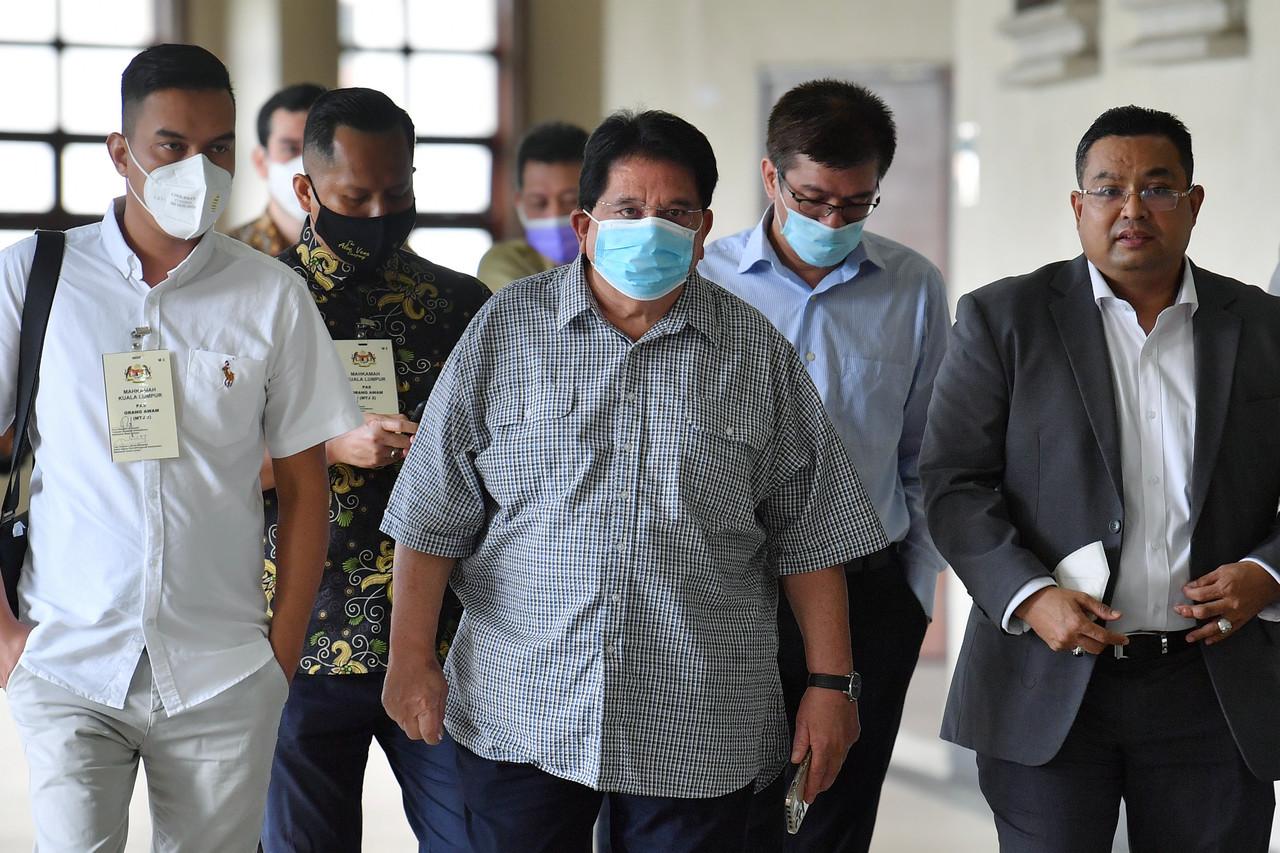 Former minister Tengku Adnan Tengku Mansor (centre) at the High Court in Kuala Lumpur where he was found guilty of receiving RM2 million from a businessman four years ago. Photo: Bernama