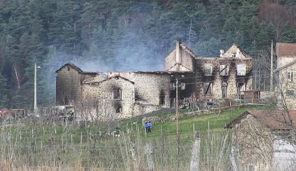 This image grab taken from an AFP TV video shows a burnt house where three gendarmes were killed and a fourth wounded when a man opened fire as they responded to a domestic violence call, Dec 23. Photo: AFP