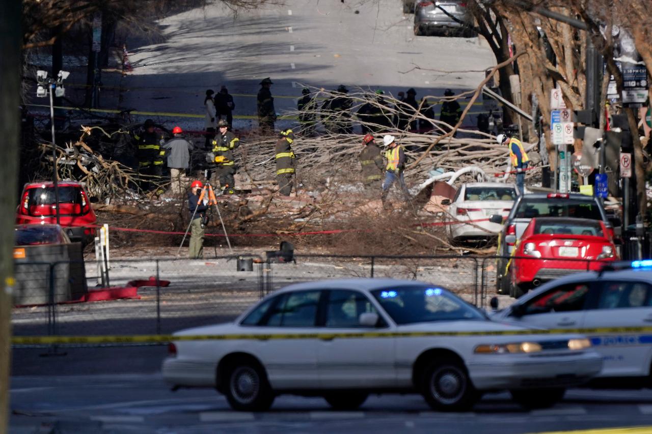 Investigators continue to examine the site of an explosion in downtown Nashville, Tennessee, Dec 27. Photo: AP