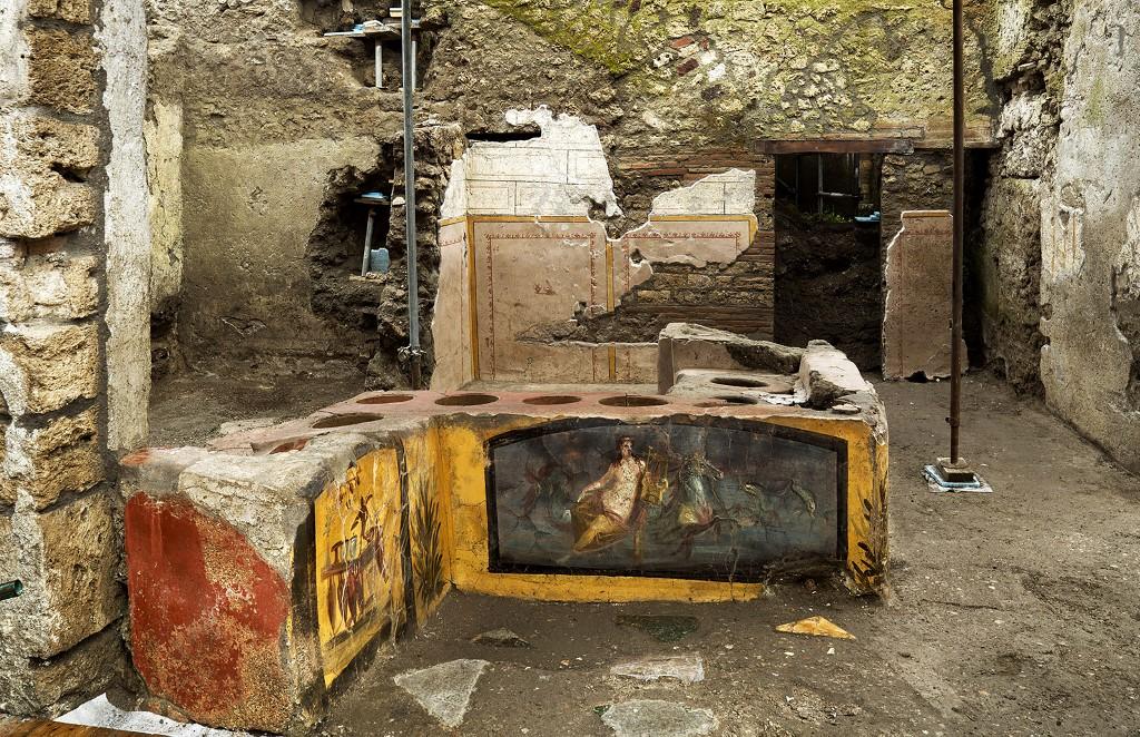 This picture released on Dec 26 by the Pompeii Press Office shows a thermopolium, a sort of street 'fast-food' counter in ancient Rome, that has been unearthed in Pompeii, decorated with polychrome motifs and in an exceptional state of preservation. Photo: AFP
