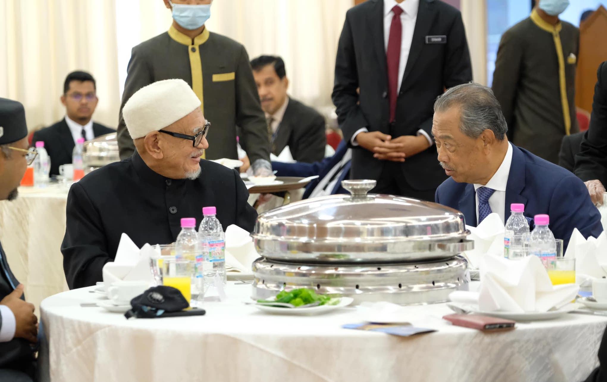 PAS president Abdul Hadi Awang with Prime Minister Muhyiddin Yassin. The Islamist party has rejected calls for it to leave the ruling coalition. Photo: Facebook