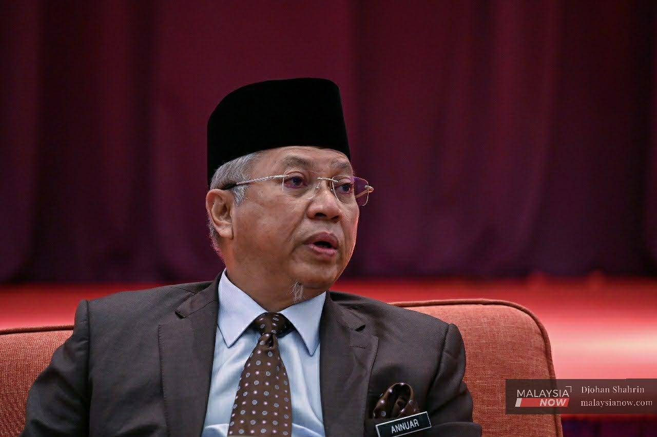 Annuar Musa speaks at a press conference in Putrajaya following his sacking as Barisan Nasional secretary-general yesterday.