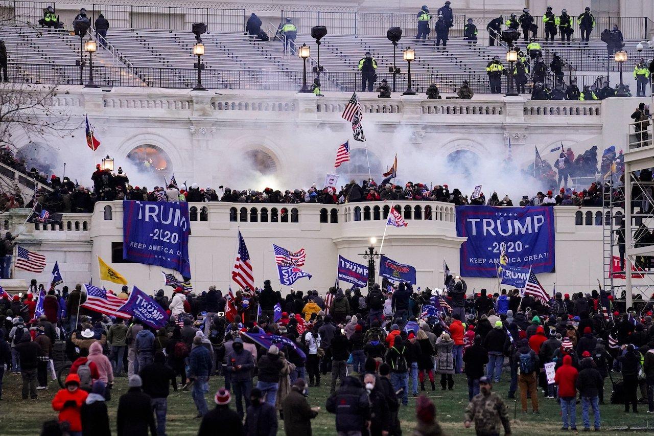 Pro-Trump protesters storm the Capitol in Washington, Jan 6. Photo: AP