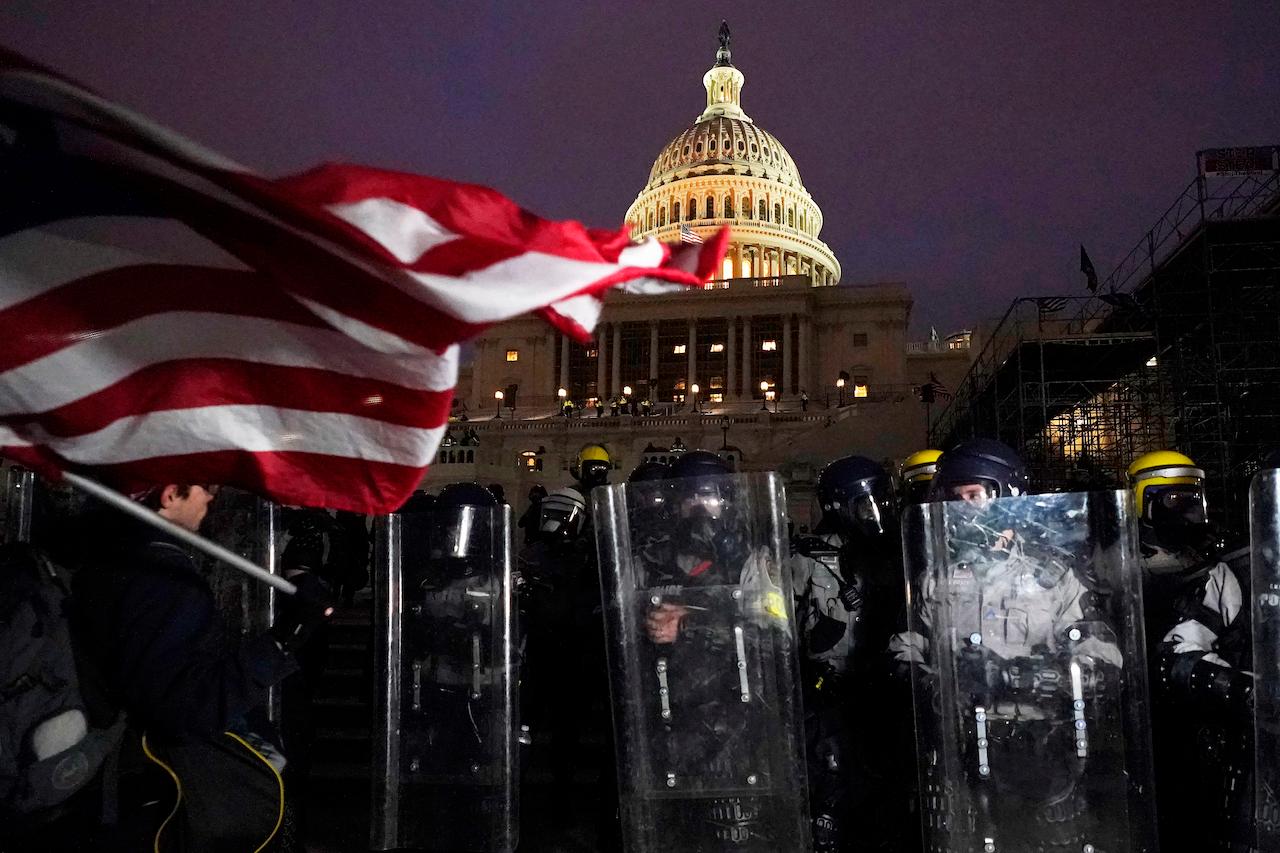 US President Donald Trump denies inciting the riot at the Capitol building last week. Photo: AP