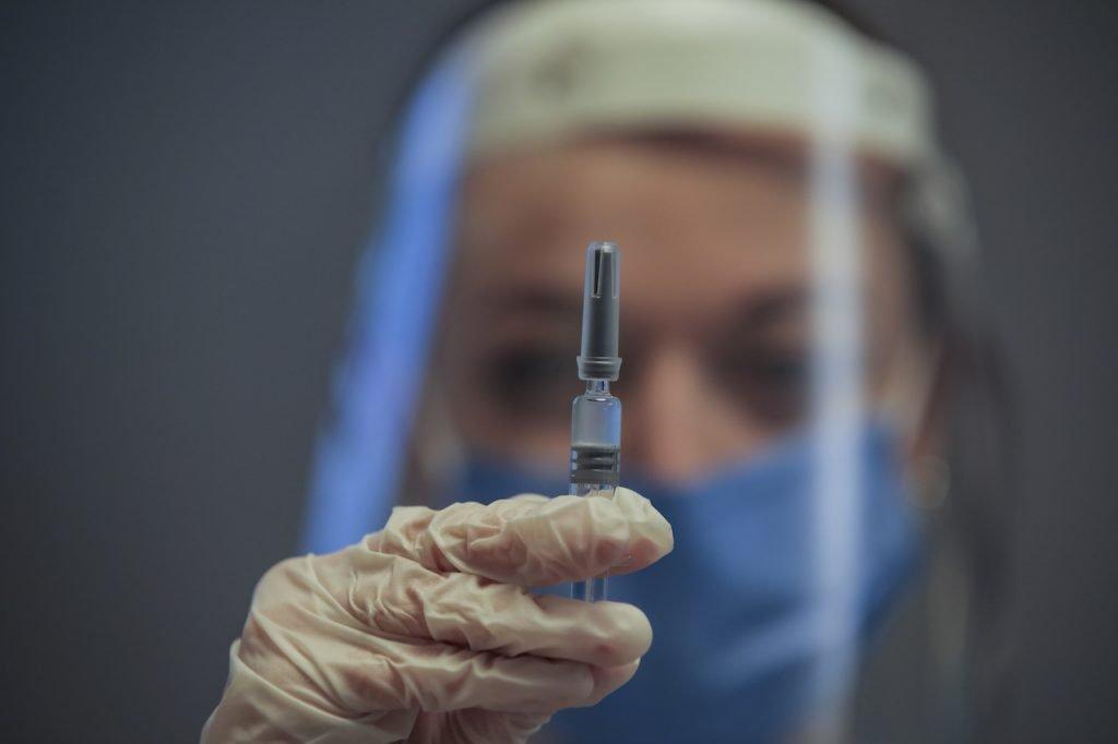 A nurse in Istanbul holds a CoronaVac vaccine made by Sinovac, Dec 21, 2020. The CoronaVac vaccine was recently reported to have achieved an efficacy rate of only 50.4% in a Brazilian trial, well below the threshold for regulatory approval. Photo: AP