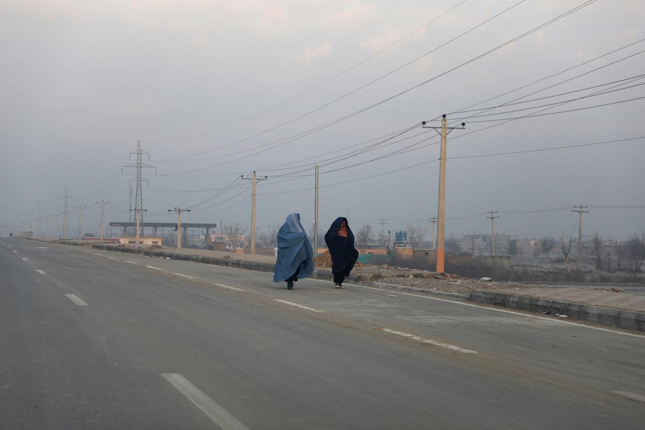 Afghan women walk on a road in Kabul, Jan 7. Polygamy is still legal in Afghanistan but the practice is said to be creating increasing demand for money to pay the 'bride price' given to a woman's family. Photo: AP