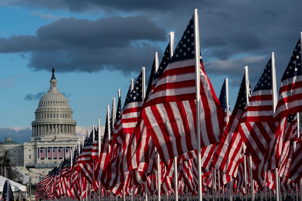 Flags are placed on the National Mall, with the US Capitol behind, ahead of the inauguration of president-elect Joe Biden and vice president-elect Kamala Harris, Jan 18, in Washington. Photo: AP