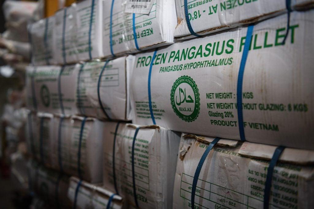 Frozen meat from New Zealand bearing the halal logo lies stacked at a warehouse in Segambut. Three Maqis officers in Johor have been remanded over a case involving a meat cartel said to have brought in meat without a halal certificate. Photo: Bernama