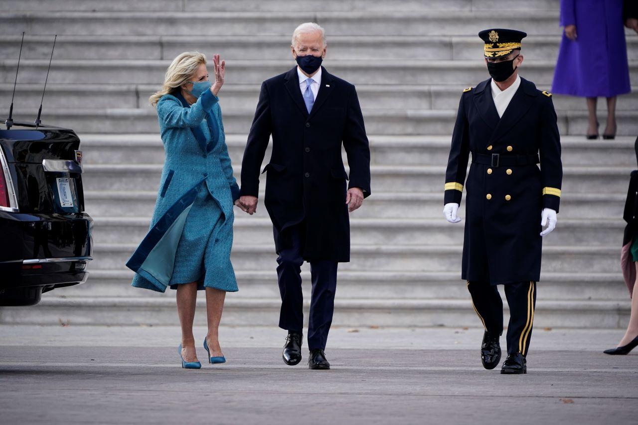 President Joe Biden and his wife Jill Biden depart the Capitol at the conclusion of the inauguration ceremony in Washington, Jan 20. Photo: AP