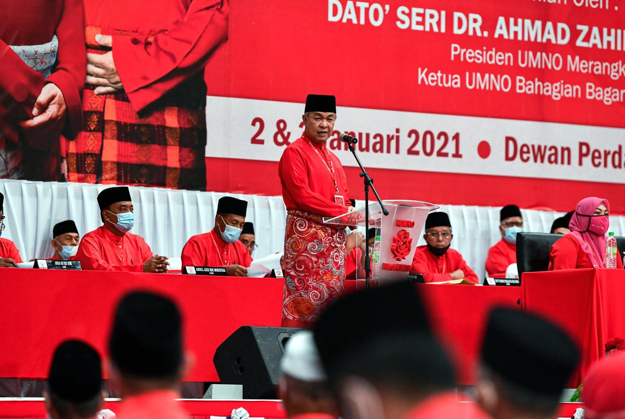 Umno president Ahmad Zahid Hamidi speaks at a meeting of party delegates from his Bagan Datuk division earlier this month. Zahid has come under increasing pressure from within his party to resign. Photo: Bernama