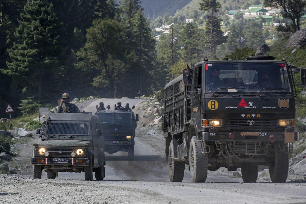 An Indian army convoy moves on the Srinagar-Ladakh highway at Gagangeer, northeast of Srinagar, on Sept 9. The incident last week came six months after a pitched battle which killed at least 20 Indian troops and an unknown number of Chinese forces. Photo: AP