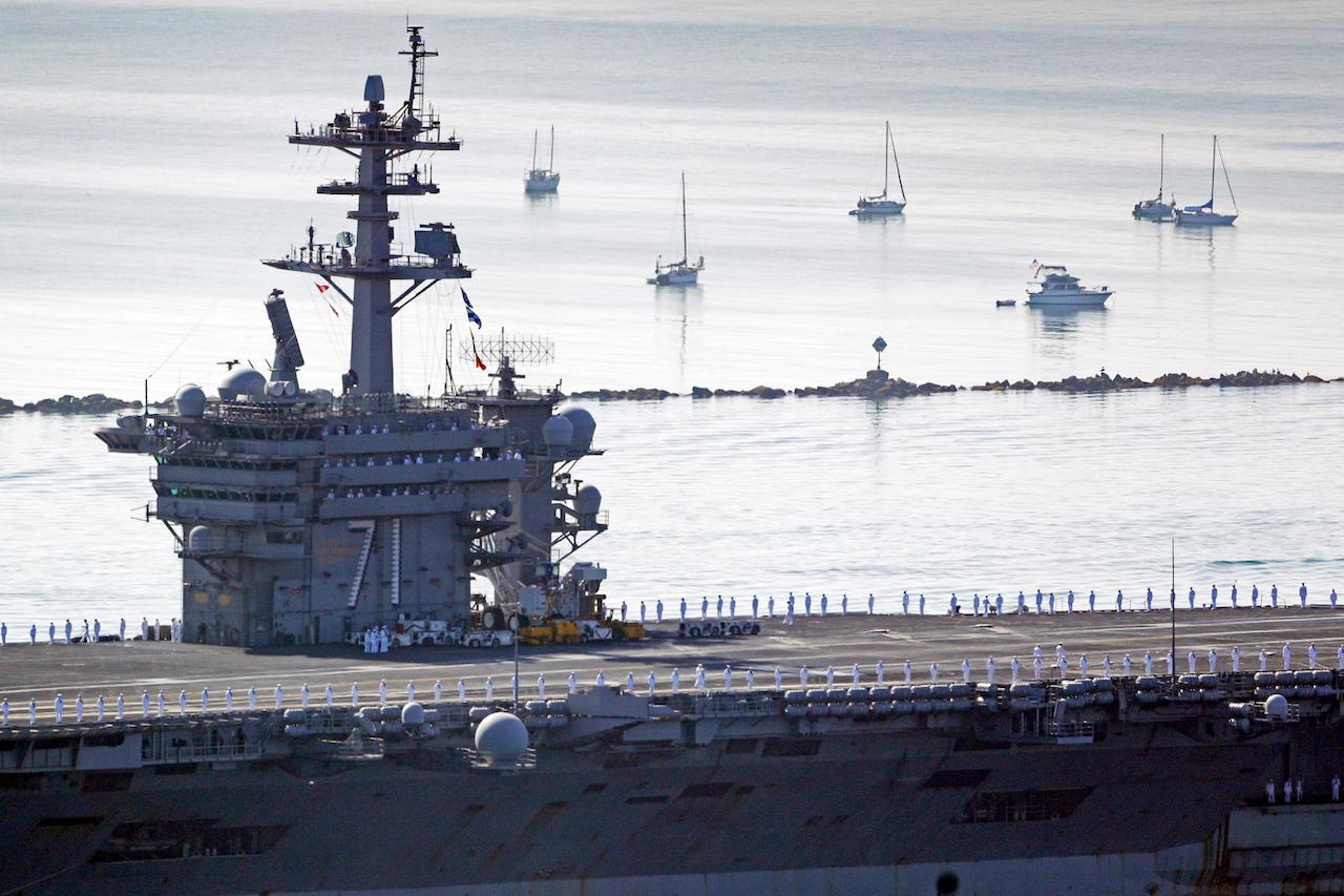 The USS Theodore Roosevelt aircraft carrier makes its way into San Diego Bay as seen from San Diego in this July 9, 2020 file photo. Photo: AP