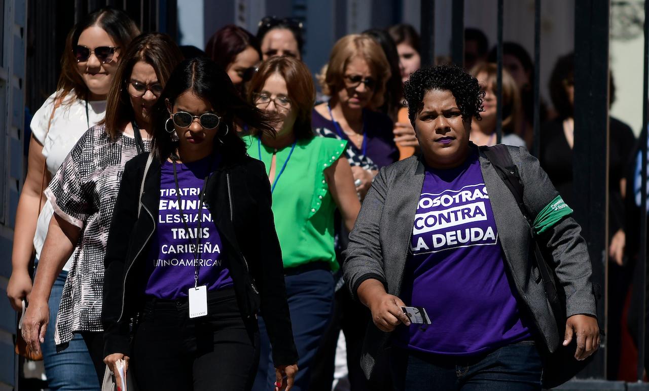 Activists enter the residence of the La Fortaleza governor to meet with Puerto Rico Governor Wanda Vazquez to talk about the rising wave of gender violence in the country in this file photo taken Aug 22, 2019. According to a 2019 report, one woman is killed every seven days in Puerto Rico. Photo: AP
