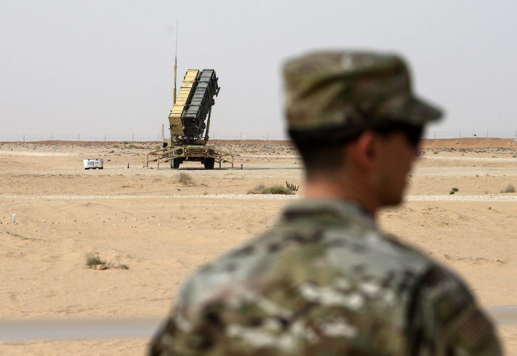 A member of the US Air Force stands near a Patriot missile battery at the Prince Sultan Air Base in al-Kharj, Saudi Arabia, Feb 20, 2020. Photo: AP