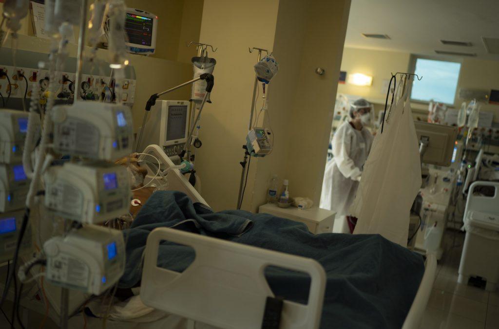 A Covid-19 patient lies in bed at the ICU of a hospital in Niteroi, Brazil, Dec 11. Brazil has ranked worst in terms of Covid-19 response in a new study by Australian think tank Lowy Institute. Photo: AP