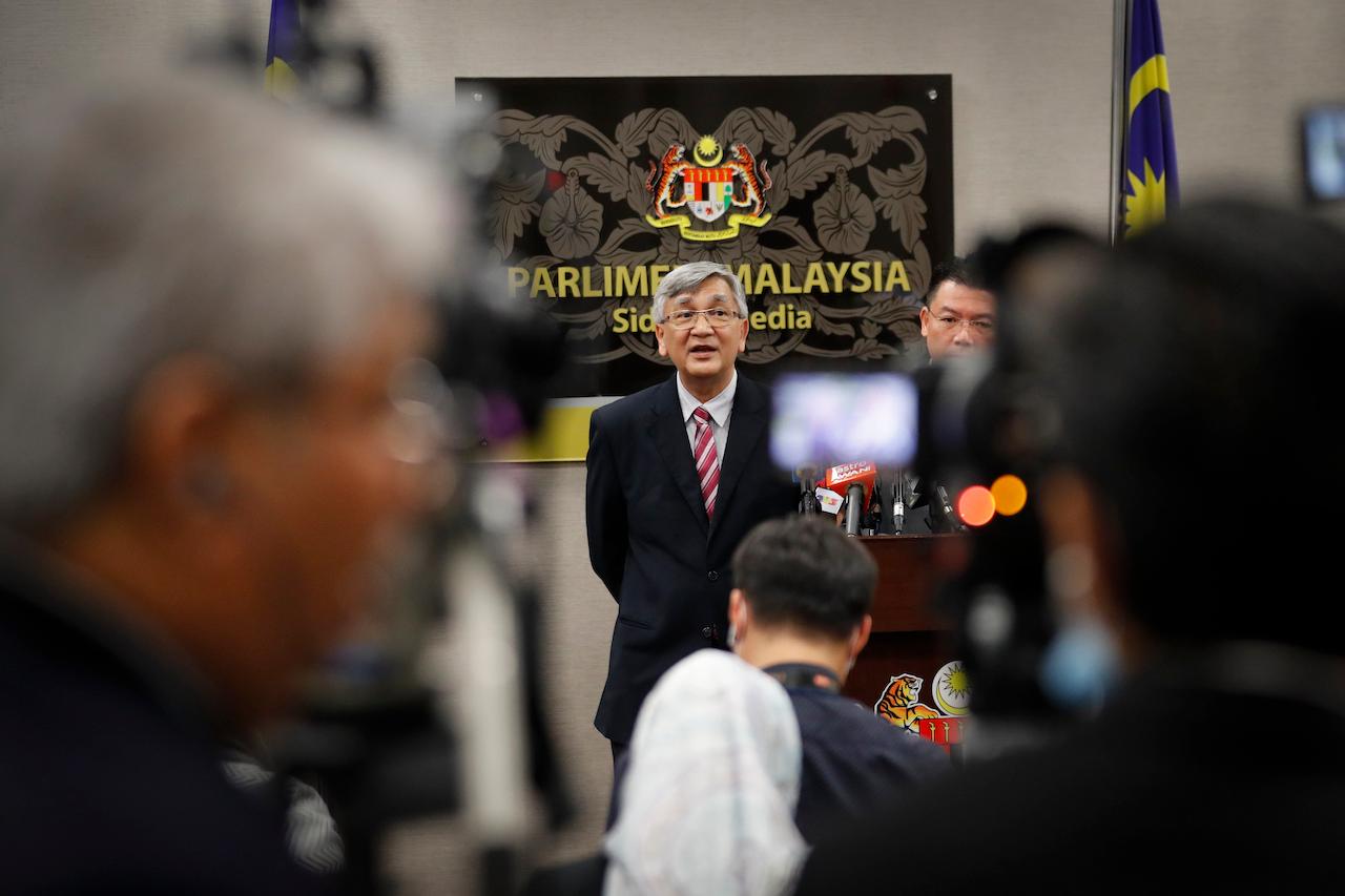 Former Dewan Rakyat speaker Mohamad Ariff Md Yusof speaks in a press conference at the Parliament building after a vote on motions to appoint a new speaker on July 13, 2020. Ariff has defended his decision not to call for a parliamentary sitting at the height of the political crisis last year. Photo: AP