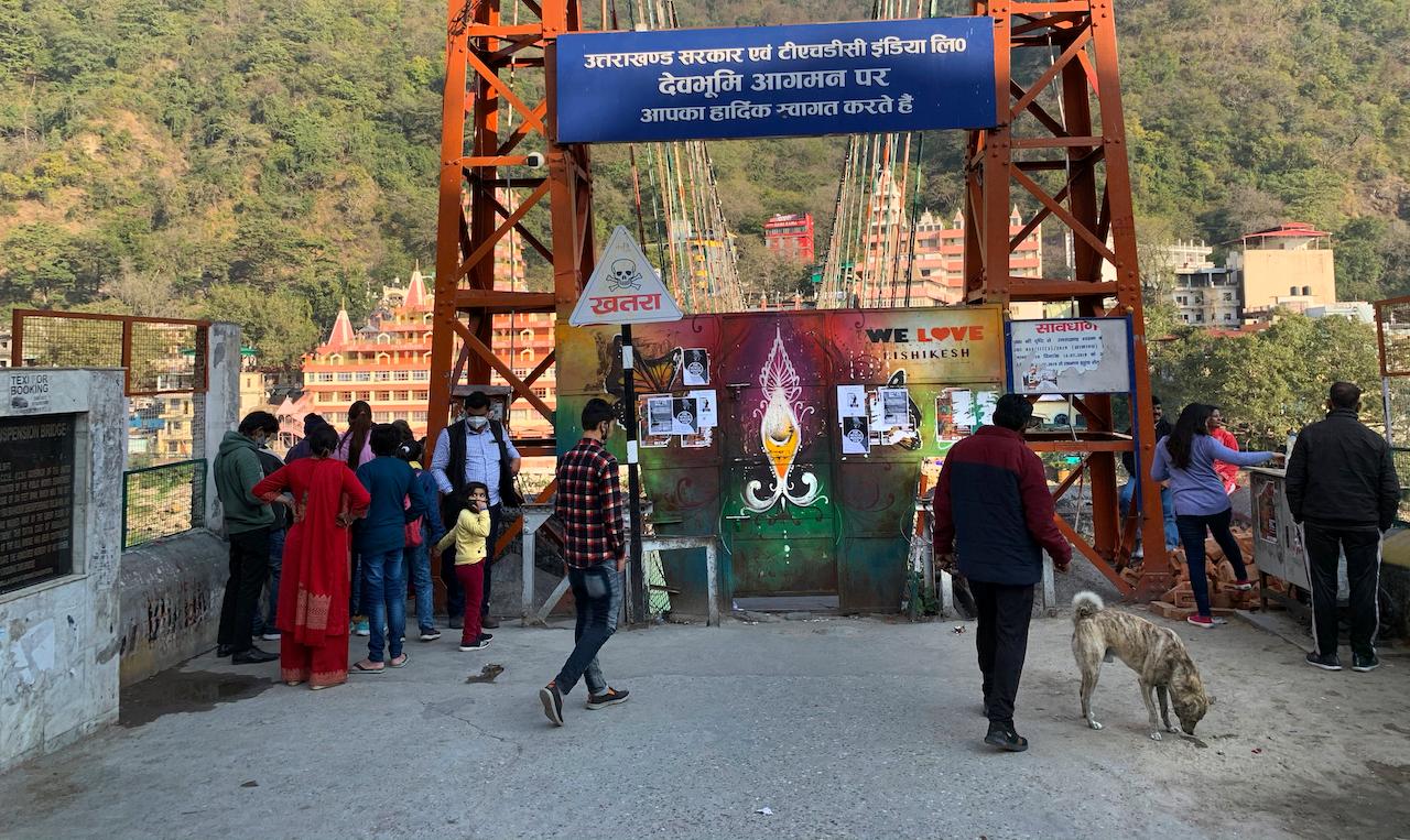 Officials close off a suspension bridge across the Ganges river as a precautionary measure after a portion of Himalayan glacier broke off in the northern state of Uttarakhand, Feb 7. Photo: AP