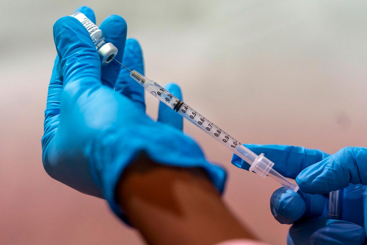 Pfizer says making the DNA that starts the vaccine process first took 16 days; soon it will take nine or 10. Photo: AP