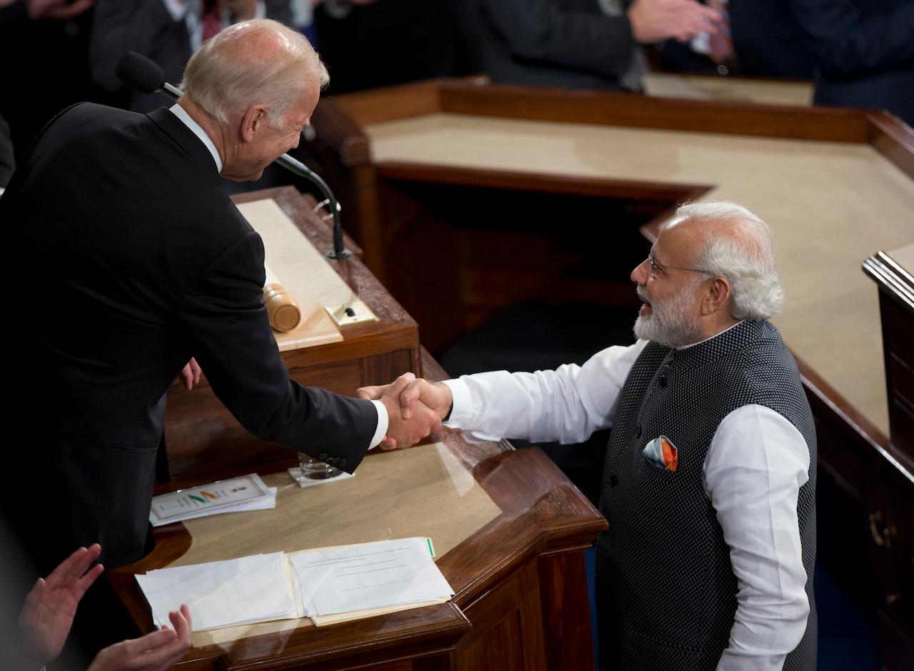 Indian Prime Minister Narendra Modi shakes hands with then-vice-president Joe Biden during his address to a joint meeting of Congress on Capitol Hill in Washington, June 8, 2016. Photo: AP